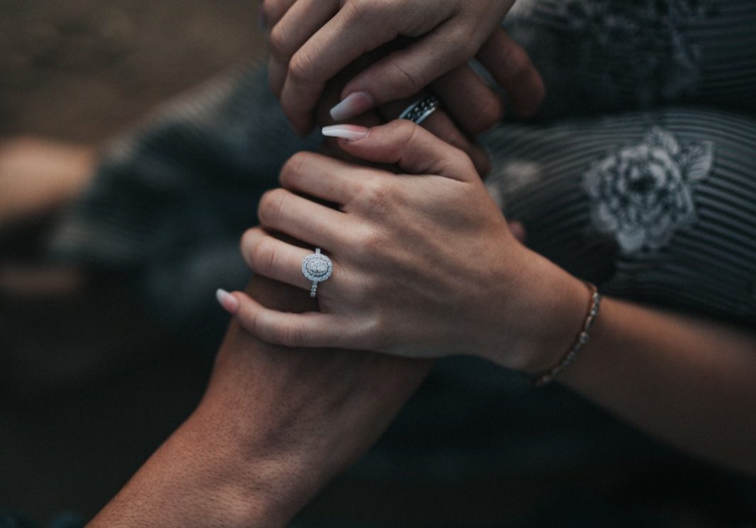 person holding string lights